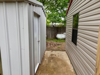 This 3 bedroom, 2 bath home is move-in ready and perfectly on Idabel Country Club in Oklahoma - for sale on GolfHomes.com, golf home, golf lot