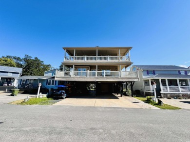 CUSTOM BUILT OCEAN VIEW KEY WEST BEACH HOUSE WITH WRAPAROUND on Prestwick Country Club in South Carolina - for sale on GolfHomes.com, golf home, golf lot