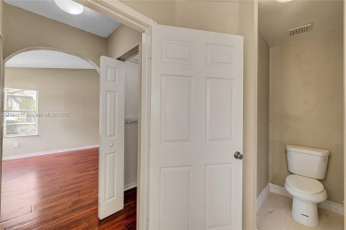 Discover elegance in this exquisite 4-bed/2.5-bath home in on Grand Palms Hotel and Golf Resort in Florida - for sale on GolfHomes.com, golf home, golf lot