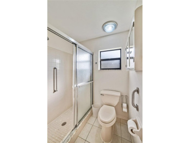 Welcome to the perfect blend of beauty and convenience in this on Falcon Watch Golf Club in Florida - for sale on GolfHomes.com, golf home, golf lot