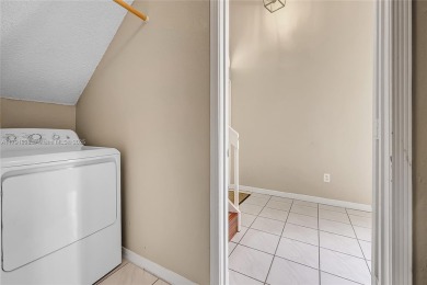 Discover elegance in this exquisite 4-bed/2.5-bath home in on Grand Palms Hotel and Golf Resort in Florida - for sale on GolfHomes.com, golf home, golf lot