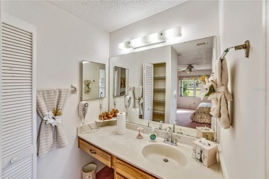 Welcome to the perfect blend of beauty and convenience in this on Falcon Watch Golf Club in Florida - for sale on GolfHomes.com, golf home, golf lot