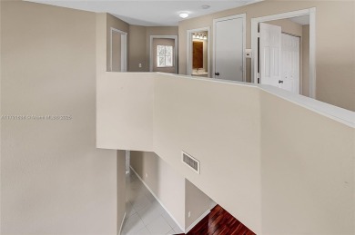 Discover elegance in this exquisite 4-bed/2.5-bath home in on Grand Palms Hotel and Golf Resort in Florida - for sale on GolfHomes.com, golf home, golf lot