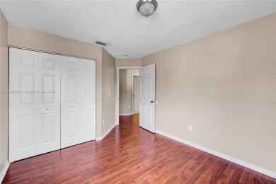 Discover elegance in this exquisite 4-bed/2.5-bath home in on Grand Palms Hotel and Golf Resort in Florida - for sale on GolfHomes.com, golf home, golf lot