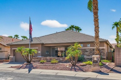 Charming home w/stone facade + extended paver front courtyard on Arizona Traditions Golf Club in Arizona - for sale on GolfHomes.com, golf home, golf lot