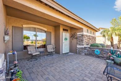 Charming home w/stone facade + extended paver front courtyard on Arizona Traditions Golf Club in Arizona - for sale on GolfHomes.com, golf home, golf lot