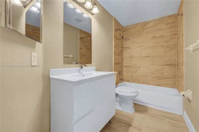 Discover elegance in this exquisite 4-bed/2.5-bath home in on Grand Palms Hotel and Golf Resort in Florida - for sale on GolfHomes.com, golf home, golf lot