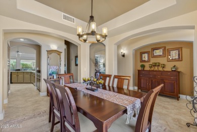 Charming home w/stone facade + extended paver front courtyard on Arizona Traditions Golf Club in Arizona - for sale on GolfHomes.com, golf home, golf lot