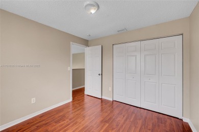 Discover elegance in this exquisite 4-bed/2.5-bath home in on Grand Palms Hotel and Golf Resort in Florida - for sale on GolfHomes.com, golf home, golf lot