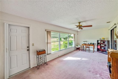 Welcome to the perfect blend of beauty and convenience in this on Falcon Watch Golf Club in Florida - for sale on GolfHomes.com, golf home, golf lot