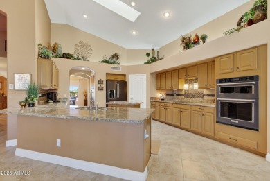 Charming home w/stone facade + extended paver front courtyard on Arizona Traditions Golf Club in Arizona - for sale on GolfHomes.com, golf home, golf lot