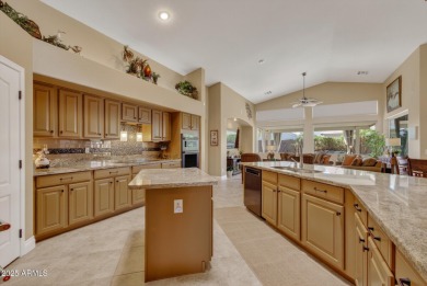 Charming home w/stone facade + extended paver front courtyard on Arizona Traditions Golf Club in Arizona - for sale on GolfHomes.com, golf home, golf lot