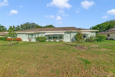 Welcome to the perfect blend of beauty and convenience in this on Falcon Watch Golf Club in Florida - for sale on GolfHomes.com, golf home, golf lot