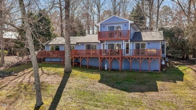 Magnificent Waterfront Home with Panoramic Lake Views! Enjoy on River Golf and County Club at Lake Royale in North Carolina - for sale on GolfHomes.com, golf home, golf lot