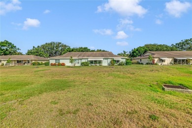 Welcome to the perfect blend of beauty and convenience in this on Falcon Watch Golf Club in Florida - for sale on GolfHomes.com, golf home, golf lot