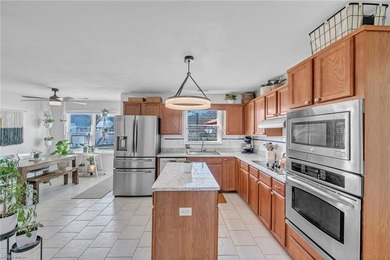 Beautifully updated 2-story residence tucked away at the end of on Sleepy Hole in Virginia - for sale on GolfHomes.com, golf home, golf lot