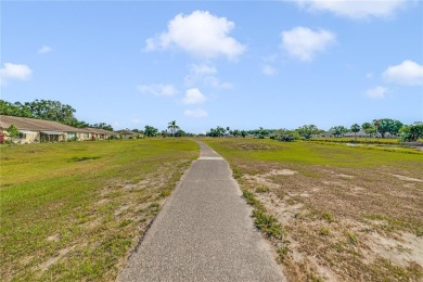 Welcome to the perfect blend of beauty and convenience in this on Falcon Watch Golf Club in Florida - for sale on GolfHomes.com, golf home, golf lot