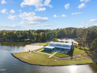 Magnificent Waterfront Home with Panoramic Lake Views! Enjoy on River Golf and County Club at Lake Royale in North Carolina - for sale on GolfHomes.com, golf home, golf lot