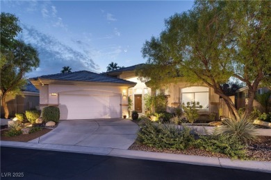 Discover refined living inside the gated Canyon Ridge community on TPC Las Vegas in Nevada - for sale on GolfHomes.com, golf home, golf lot