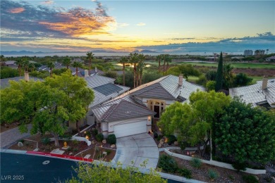 Discover refined living inside the gated Canyon Ridge community on TPC Las Vegas in Nevada - for sale on GolfHomes.com, golf home, golf lot