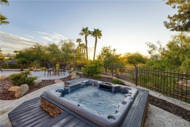 Discover refined living inside the gated Canyon Ridge community on TPC Las Vegas in Nevada - for sale on GolfHomes.com, golf home, golf lot