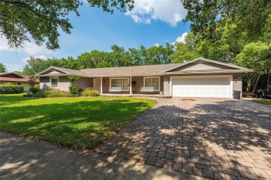 This beautifully maintained home features 4-bedrooms, 2.5-baths on Rio Pinar Golf and Country Club in Florida - for sale on GolfHomes.com, golf home, golf lot