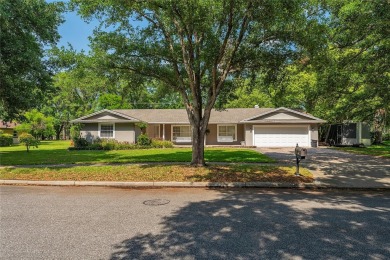This beautifully maintained home features 4-bedrooms, 2.5-baths on Rio Pinar Golf and Country Club in Florida - for sale on GolfHomes.com, golf home, golf lot