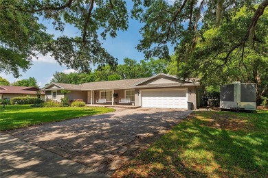 This beautifully maintained home features 4-bedrooms, 2.5-baths on Rio Pinar Golf and Country Club in Florida - for sale on GolfHomes.com, golf home, golf lot