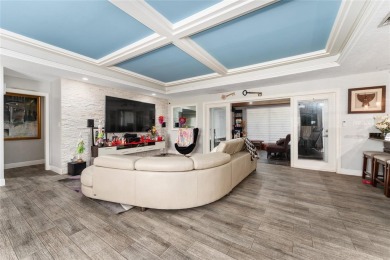 This beautifully maintained home features 4-bedrooms, 2.5-baths on Rio Pinar Golf and Country Club in Florida - for sale on GolfHomes.com, golf home, golf lot