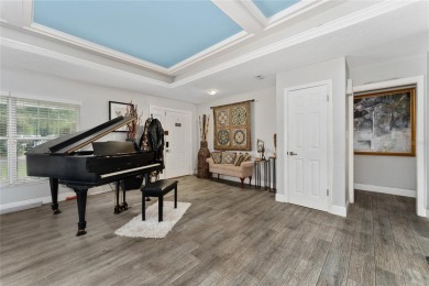 This beautifully maintained home features 4-bedrooms, 2.5-baths on Rio Pinar Golf and Country Club in Florida - for sale on GolfHomes.com, golf home, golf lot