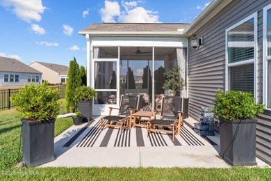 Contemporary coastal elegance defines this nearly new Eagle Run on Crow Creek Golf Club in North Carolina - for sale on GolfHomes.com, golf home, golf lot