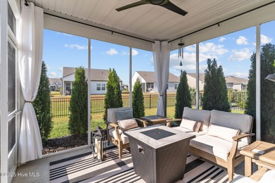 Contemporary coastal elegance defines this nearly new Eagle Run on Crow Creek Golf Club in North Carolina - for sale on GolfHomes.com, golf home, golf lot