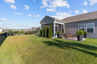 Contemporary coastal elegance defines this nearly new Eagle Run on Crow Creek Golf Club in North Carolina - for sale on GolfHomes.com, golf home, golf lot
