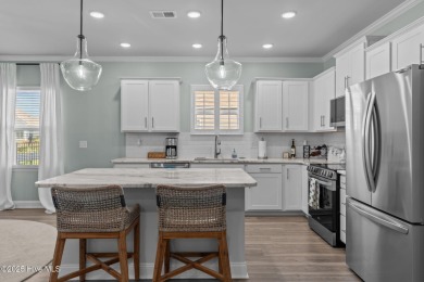 Contemporary coastal elegance defines this nearly new Eagle Run on Crow Creek Golf Club in North Carolina - for sale on GolfHomes.com, golf home, golf lot