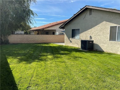 Welcome to this inviting 3-bedroom, 2-bathroom home in a on Spring Valley Lake Country Club in California - for sale on GolfHomes.com, golf home, golf lot