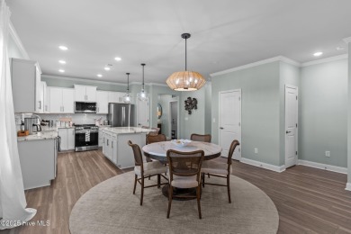 Contemporary coastal elegance defines this nearly new Eagle Run on Crow Creek Golf Club in North Carolina - for sale on GolfHomes.com, golf home, golf lot