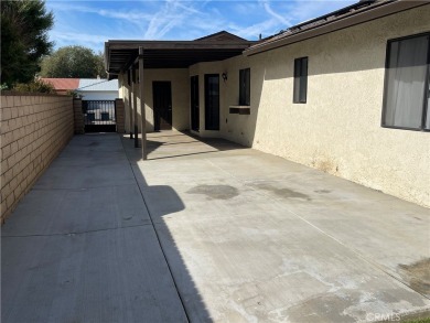 Welcome to this inviting 3-bedroom, 2-bathroom home in a on Spring Valley Lake Country Club in California - for sale on GolfHomes.com, golf home, golf lot