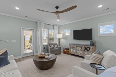 Contemporary coastal elegance defines this nearly new Eagle Run on Crow Creek Golf Club in North Carolina - for sale on GolfHomes.com, golf home, golf lot