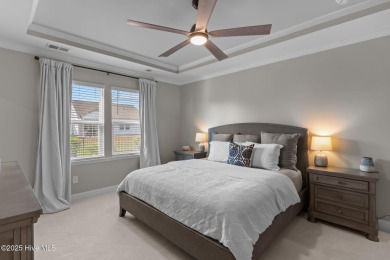 Contemporary coastal elegance defines this nearly new Eagle Run on Crow Creek Golf Club in North Carolina - for sale on GolfHomes.com, golf home, golf lot