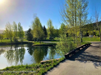 Welcome to your dream retreat at Teton Springs! Nestled among on Teton Springs Resort and Club in Idaho - for sale on GolfHomes.com, golf home, golf lot