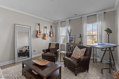 Contemporary coastal elegance defines this nearly new Eagle Run on Crow Creek Golf Club in North Carolina - for sale on GolfHomes.com, golf home, golf lot