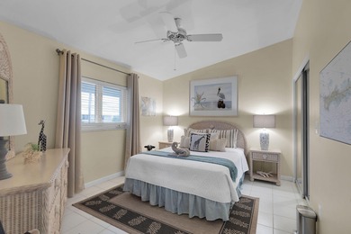 This exceptional waterfront residence in Key Colony Beach offers on Key Colony Beach Golf Course in Florida - for sale on GolfHomes.com, golf home, golf lot