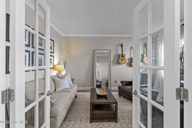 Contemporary coastal elegance defines this nearly new Eagle Run on Crow Creek Golf Club in North Carolina - for sale on GolfHomes.com, golf home, golf lot