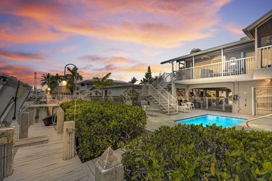 This exceptional waterfront residence in Key Colony Beach offers on Key Colony Beach Golf Course in Florida - for sale on GolfHomes.com, golf home, golf lot