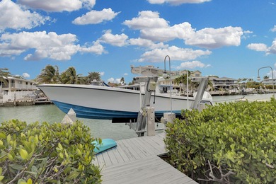 This exceptional waterfront residence in Key Colony Beach offers on Key Colony Beach Golf Course in Florida - for sale on GolfHomes.com, golf home, golf lot