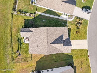 Contemporary coastal elegance defines this nearly new Eagle Run on Crow Creek Golf Club in North Carolina - for sale on GolfHomes.com, golf home, golf lot