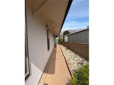 Welcome to 10500 Frontier Trail, a beautifully spacious home on Morongo Golf Club at Tukwet Canyon in California - for sale on GolfHomes.com, golf home, golf lot