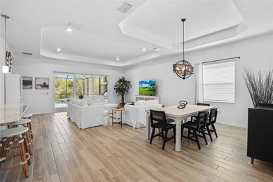 Wake up every day feeling like you're on vacation in this on Heritage Landing Golf  in Florida - for sale on GolfHomes.com, golf home, golf lot