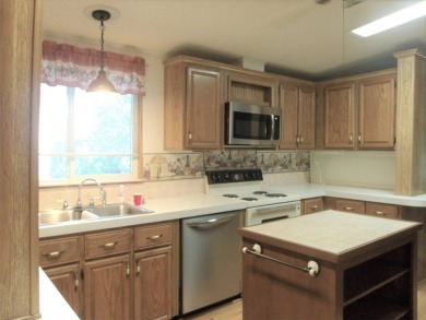 Exquisite 3-Bedroom Palm Harbor Home on the Golf Course! on Schalamar Creek Golf and Country Club in Florida - for sale on GolfHomes.com, golf home, golf lot
