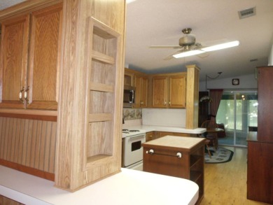 Exquisite 3-Bedroom Palm Harbor Home on the Golf Course! on Schalamar Creek Golf and Country Club in Florida - for sale on GolfHomes.com, golf home, golf lot
